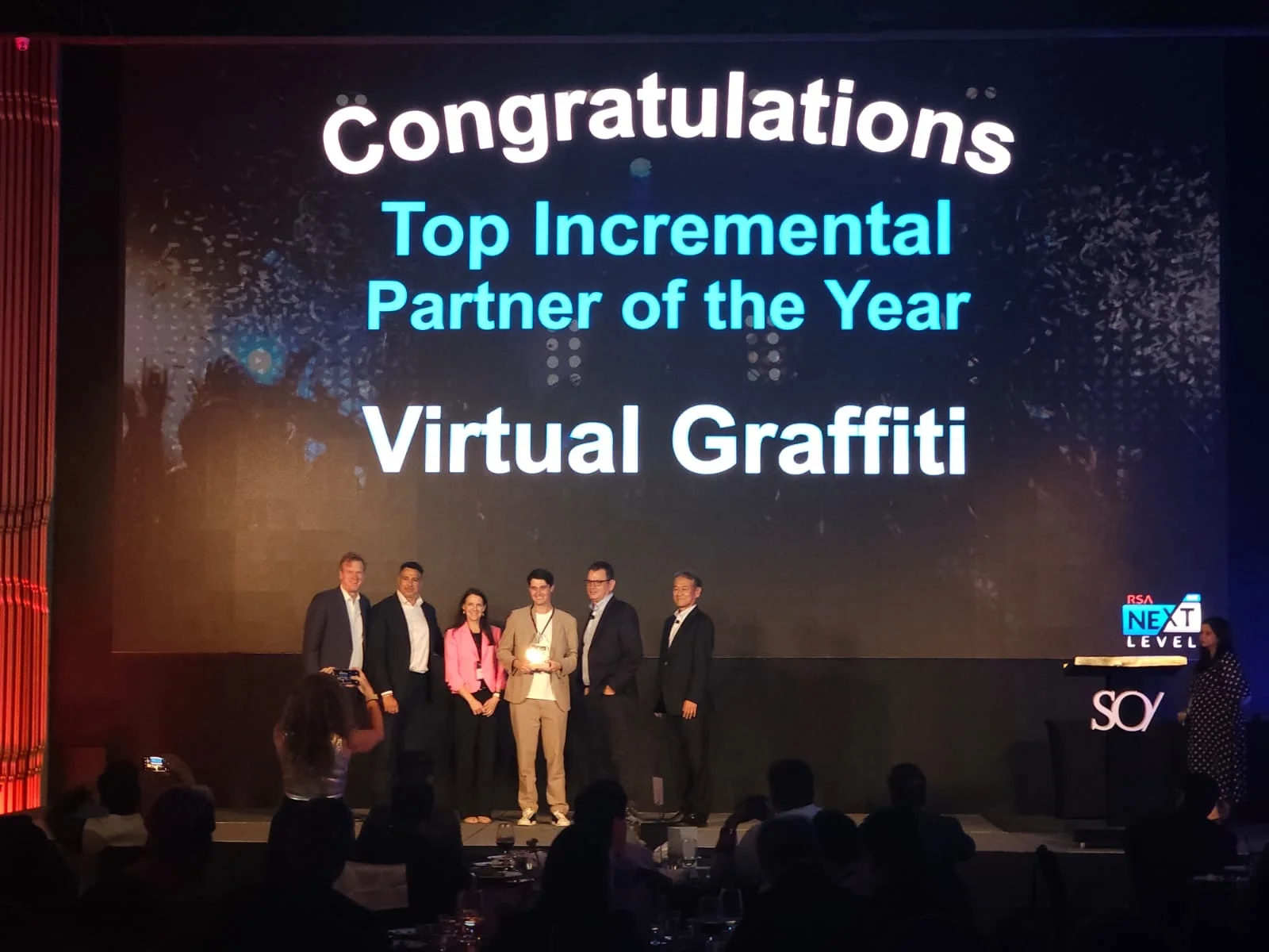 Virtual Graffiti team accepting the 2026 RSA Top Incremental Partner of the Year award